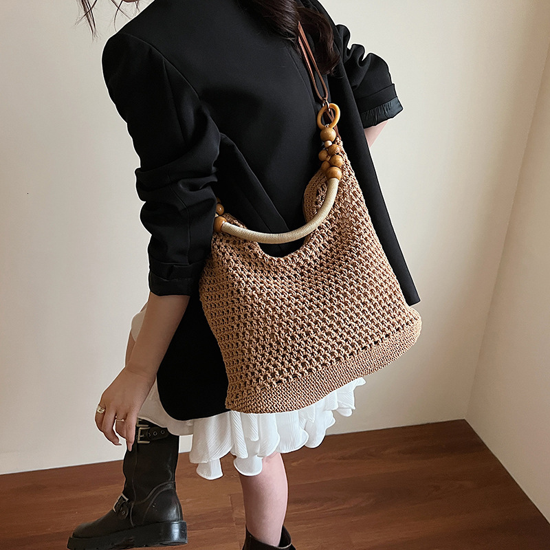 Free shipping designer Beach Vacation Beach Bag for Women 2025 New Summer Large Capacity Hollow Woven Bag Shoulder Bag Crossbody Bag Tote Bag Trendy