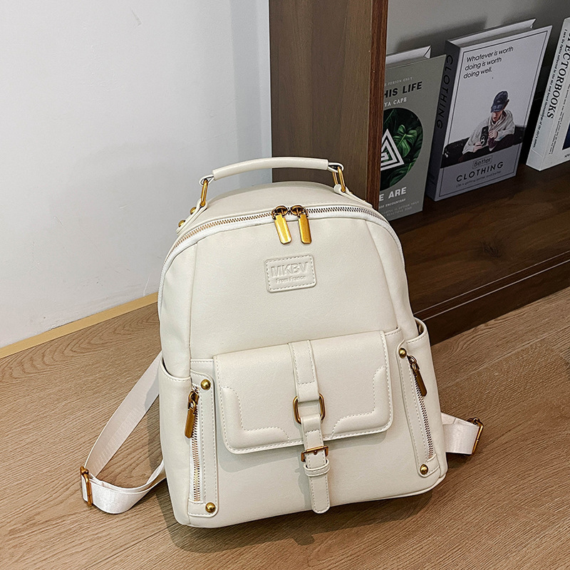 Free shipping designer New Korean and Japanese Style Casual Backpack for Women Large Capacity Soft Leather Commuter Backpack Fashionable Retro Student