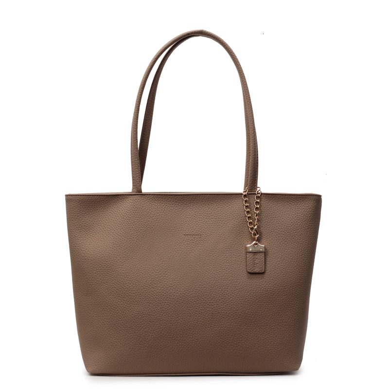 Free shipping designer Large Capacity Tote Bag Simple Versatile Shoulder Bag Underarm Bag for Women 2025 Summer New Fashion Versatile Commuter Bag