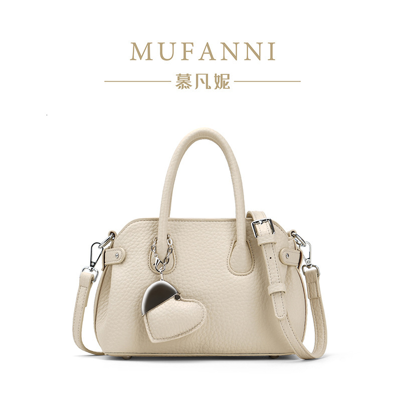 Free shipping designer 2025 New Luxury Niche Design High-Quality Crossbody Bag Handbag Women Bag Bowling Bag Shell Bag