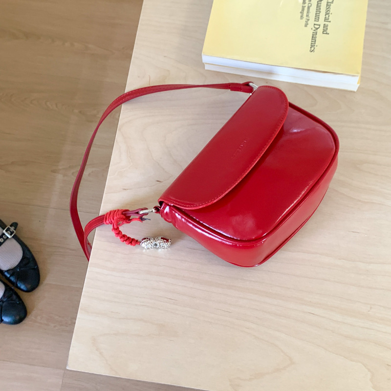 Free shipping designer 2025 Summer New Korean Retro Ins Style Red Saddle Bag Crossbody Bag Small Bag for Women Versatile Simple Phone Bag