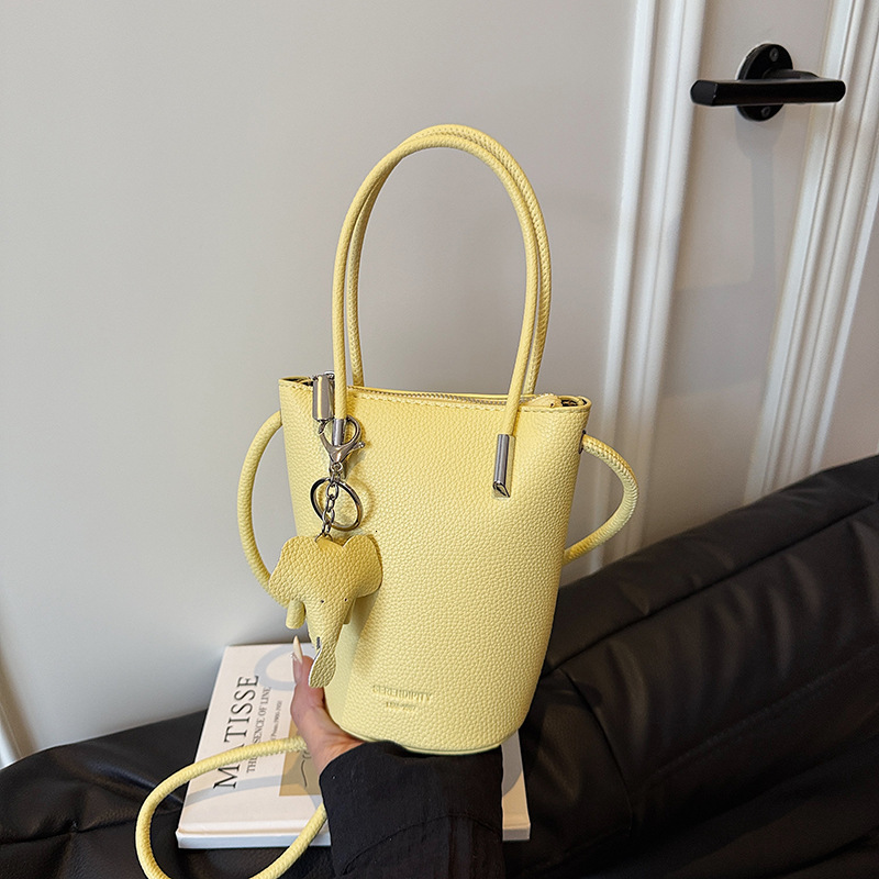 Free shipping designer Summer Super Hot Yellow Bucket Bag Women 2025 New Light Luxury Niche Design High-end Crossbody Bag Phone Bag