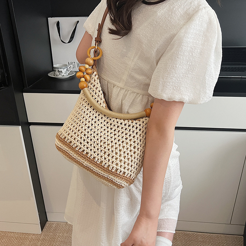Free shipping designer Beach Vacation Beach Bag for Women 2025 New Summer Large Capacity Hollow Woven Bag Shoulder Bag Crossbody Bag Tote Bag Trendy
