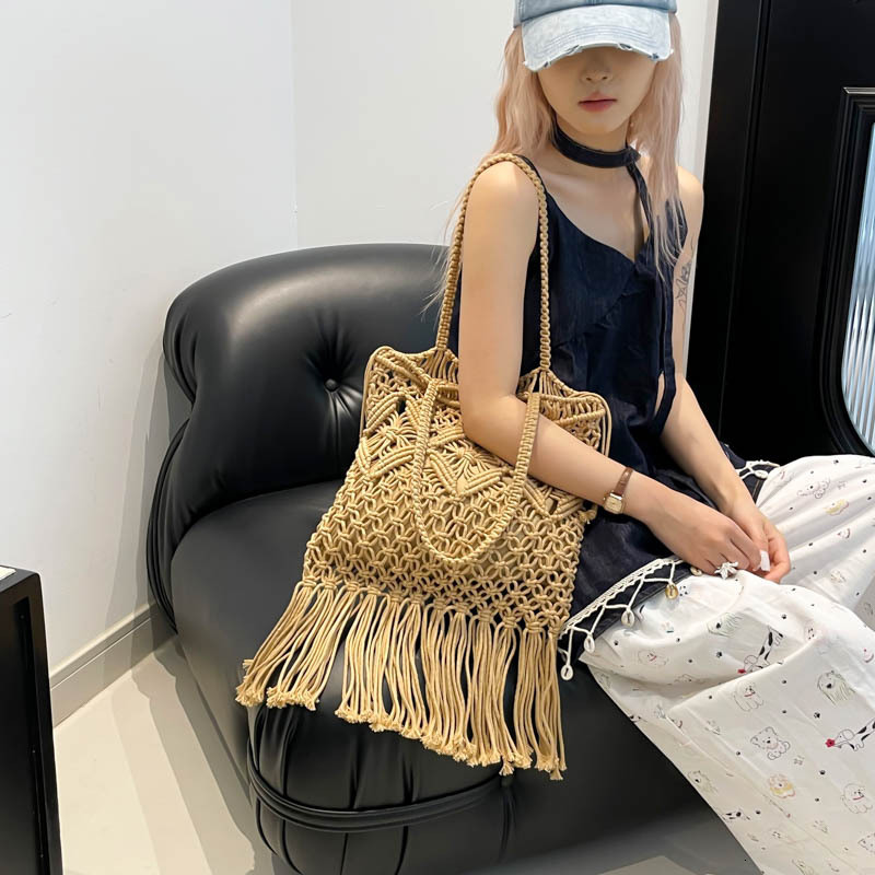 Free shipping designer Summer Cotton Woven Bag for Women 2025 New Hollow Tassel Phone Bag Beach Vacation Crossbody Small Bag