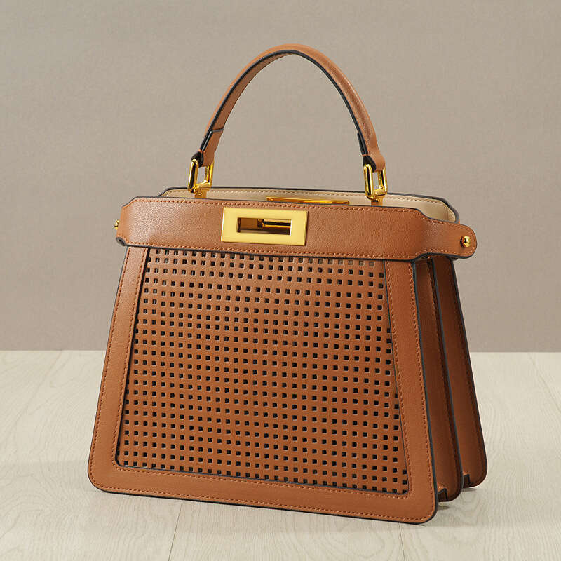 Leather Bag Bucket Bag New Style Wind Organ Cowhide Women S Hollow Cat Handbag Twist Lock Tote Handheld Shoulder Bag Trendy Tote Bag