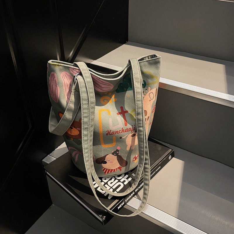 Free shipping designer 2025 New Cute Bag Casual Fashion Versatile Commuter Shoulder Bag Crossbody Bag Extended Bucket Bag Niche Design