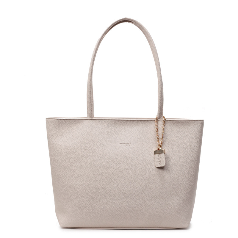 Free shipping designer Large Capacity Tote Bag Simple Versatile Shoulder Bag Underarm Bag for Women 2025 Summer New Fashion Versatile Commuter Bag