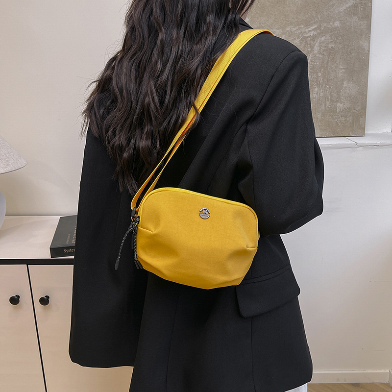 Free shipping designer Nylon Small Bag 2025 New Ins Fashion Single Shoulder Bag Lightweight Casual Solid Color Unisex Crossbody Bag