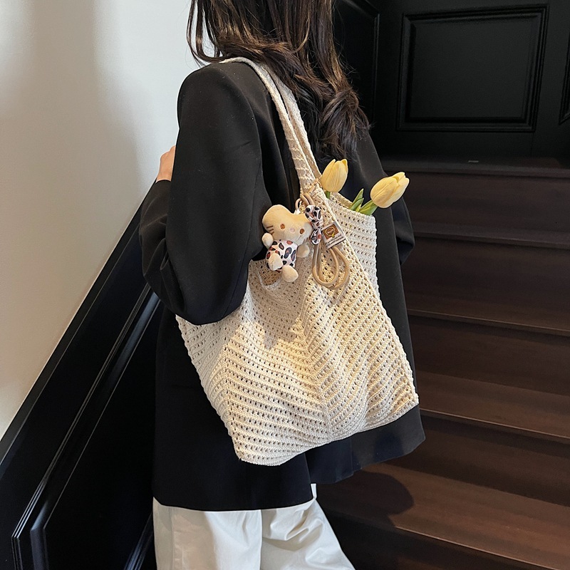 Free shipping designer Cotton Thread Woven Bag for Women 2025 New Knitted Hollow Shoulder Bag Tote Bag Lazy Style Beach Vacation Beach Bag