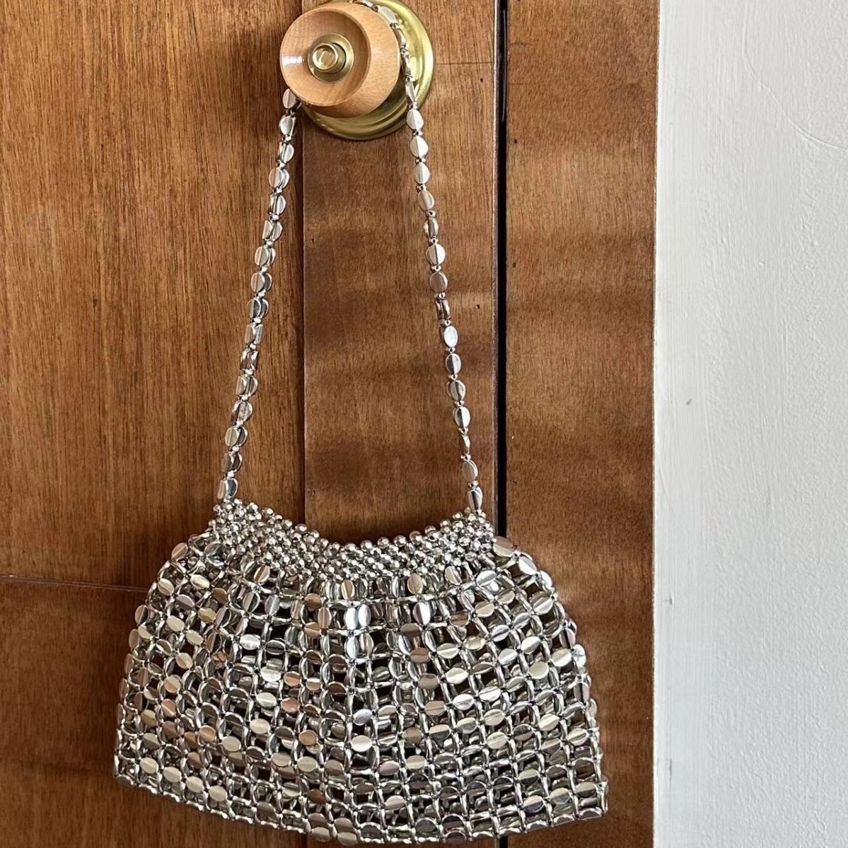 New retro metal silver handbag designer bag hollow hand woven bead trend single shoulder armpit bag women s single trend shoulder bag