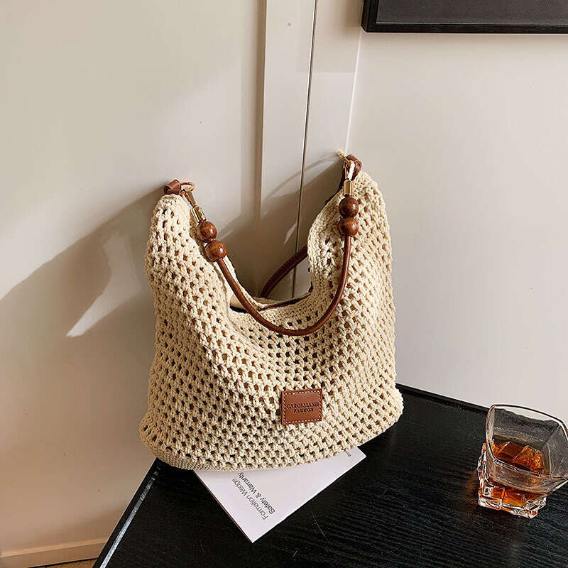 Vacation Style Woven For Women 2025 Summer New Fashion New Hollow Knit Shoulder Large Capacity Commuter Tote Bag