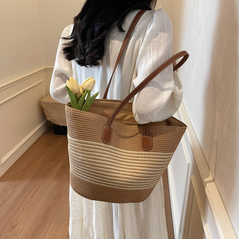 Free shipping designer Straw Beach Bag Versatile Handbag Large Capacity Shoulder Bag Basket French Style Straw Bag Bucket Tote Bag New Model