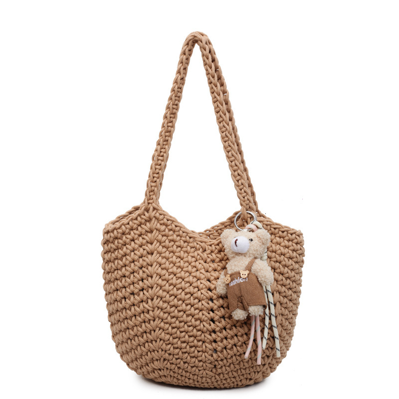 Free shipping designer Super Popular Beach Vacation Bag for Women 2025 New Commuter Tote Bag Large Capacity Hollow Woven Shoulder Bag