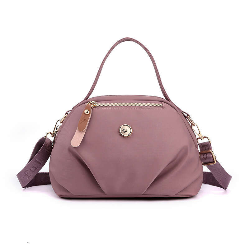 New shoulder bag women's hand-held dumpling bag mobile phone bag large capacity fashionable and casual