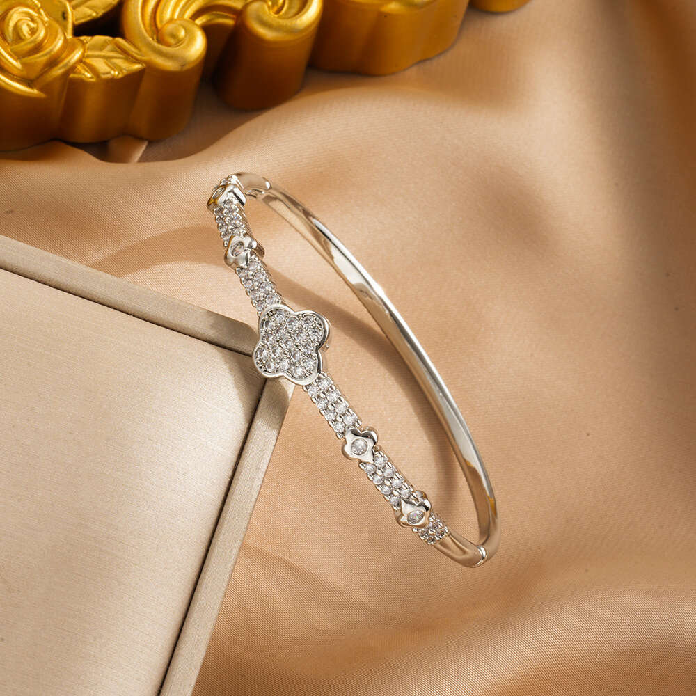 DHcollections New Full Zircon Bracelet Open High-end Design with Inlaid Dias for Women Four-leaf Clover Non-fading