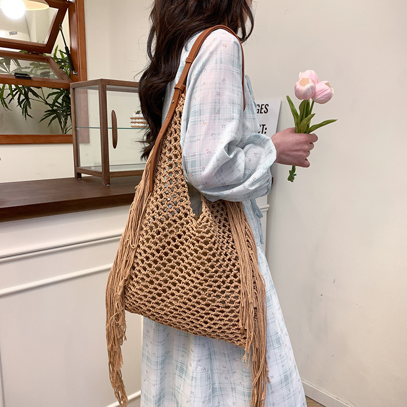 Free shipping designer Spring Summer Large Capacity Tassel Woven Bag for Women 2025 New Hollow Out Beach Vacation Beach Bag Underarm Bag Shoulder Bag
