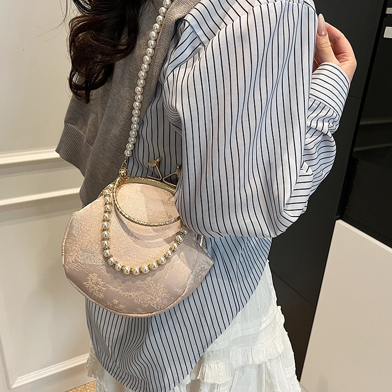 Free shipping designer New Chinese Style Pearl Fashion Handbag for Women National Style Fashionable and Elegant Niche Design Shoulder Bag Crossbody Ba