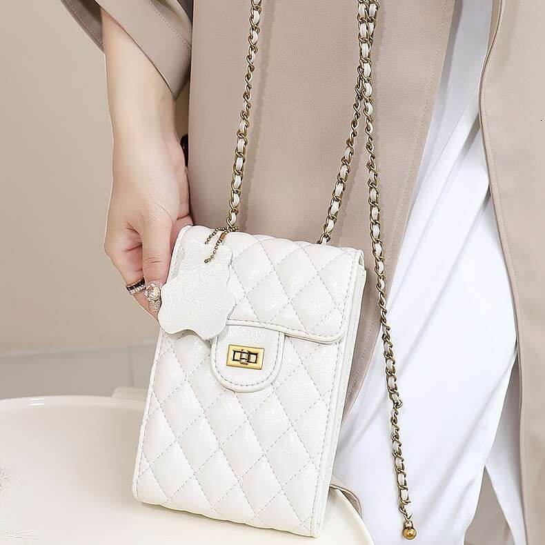 Single shoulder crossbody mini bag 2025 new leather tassel hardware ball diamond grid chain mobile phone bag