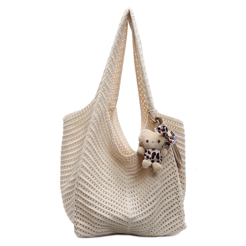 Free shipping designer Cotton Thread Woven Bag for Women 2025 New Knitted Hollow Shoulder Bag Tote Bag Lazy Style Beach Vacation Beach Bag