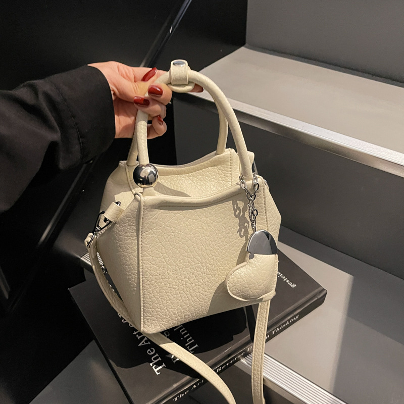 Free shipping designer Pink Handbag Small Tote Bag for Women 2025 New Spring Light Luxury Niche High-End Crossbody Bag Basket Bag Bucket Bag
