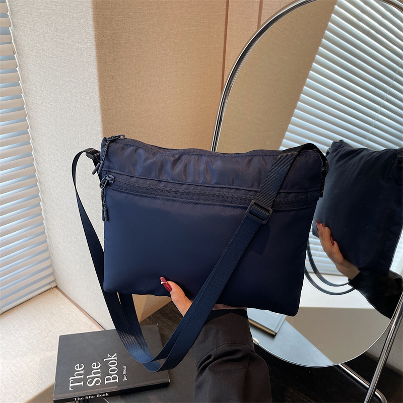 Free shipping designer New Fashion Lightweight Stylish Women Small Bag Korean Version Casual Bucket Bag Versatile Crossbody Bag Women Bag