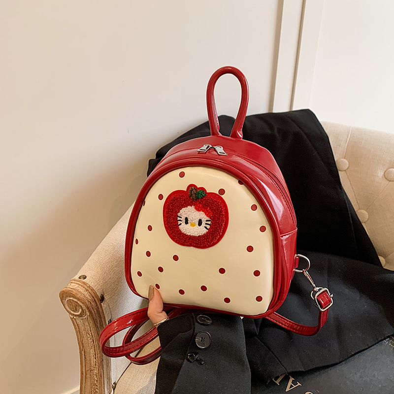 Free shipping designer Cute Apple Polka Dot Cat Backpack for Women 2025 New Trendy Fashionable College Style Backpack Handbag School Bag