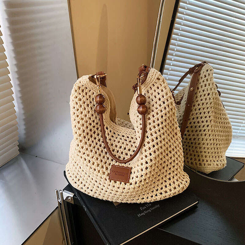 Vacation Style Woven For Women 2025 Summer New Fashion New Hollow Knit Shoulder Large Capacity Commuter Tote Bag