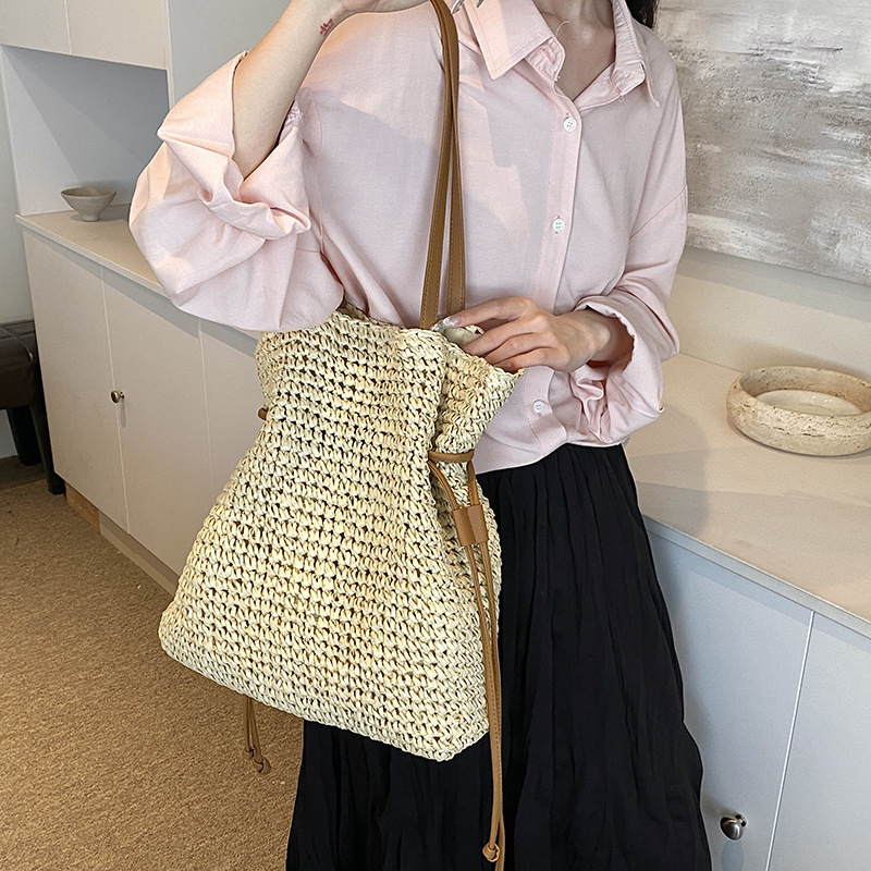 Free shipping designer Summer Lazy Style Straw Woven Single Shoulder Bag for Women 2025 New Summer Beach Vacation Large Capacity Drawstring Handbag St