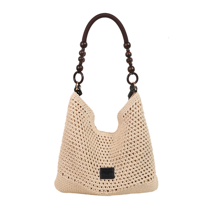 Free shipping designer Beach Vacation Beach Woven Bag for Women 2025 New Summer Hollow Knitted Handbag Large Capacity Shoulder Bag Straw Bag