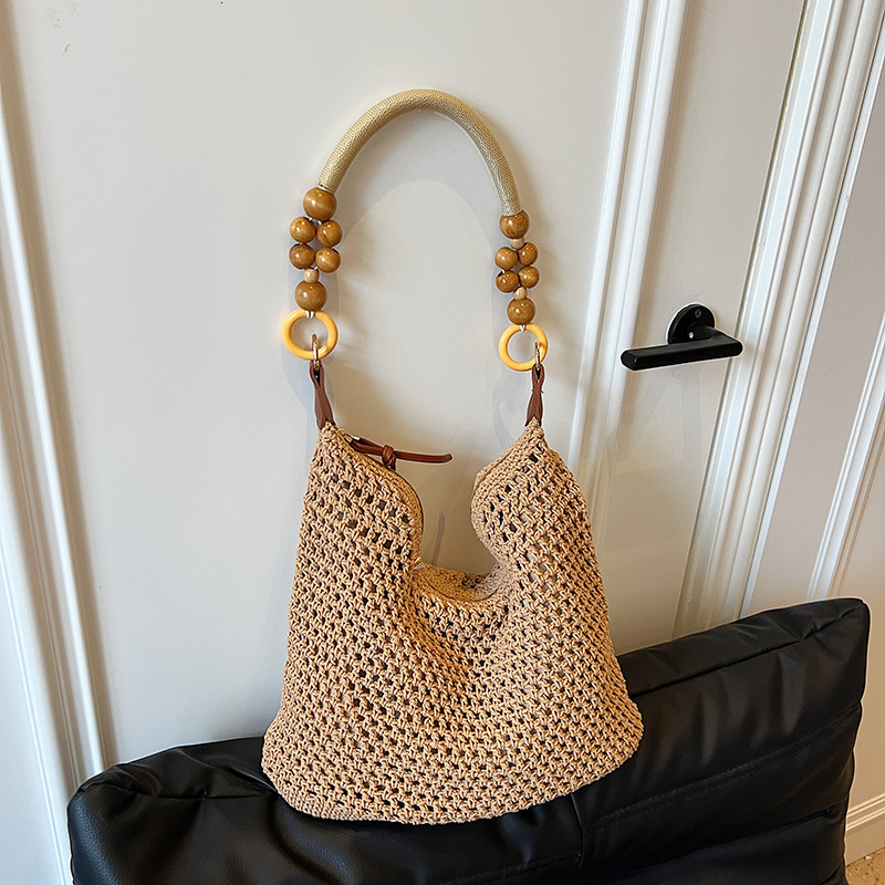 Free shipping designer Beach Vacation Beach Bag for Women 2025 New Summer Large Capacity Hollow Woven Bag Shoulder Bag Crossbody Bag Tote Bag Trendy