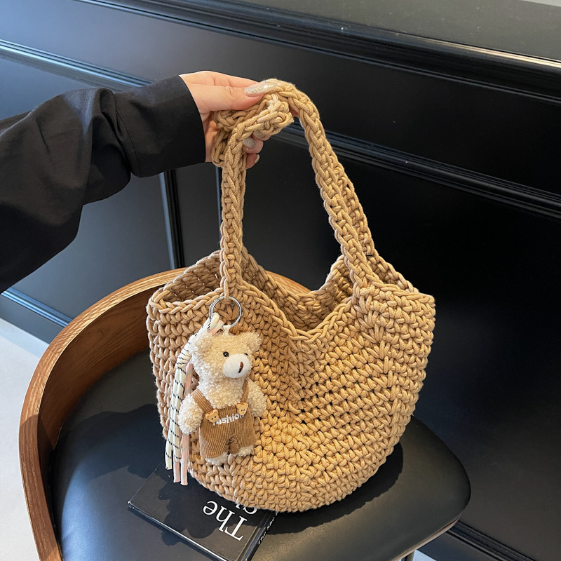 Free shipping designer Super Popular Beach Vacation Bag for Women 2025 New Commuter Tote Bag Large Capacity Hollow Woven Shoulder Bag