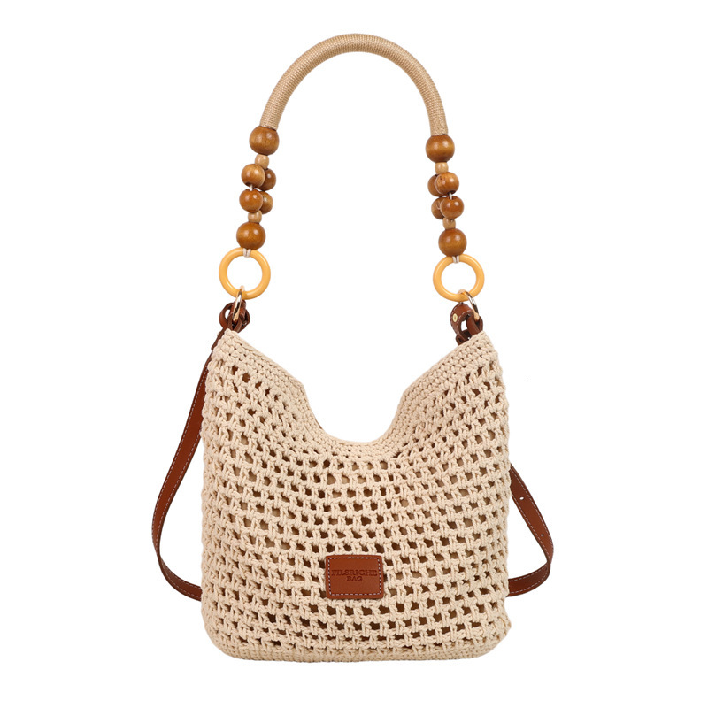 Free shipping designer Beach Vacation Beach Woven Bag for Women 2025 New Summer Hollow Knitted Handbag Large Capacity Shoulder Bag Straw Bag