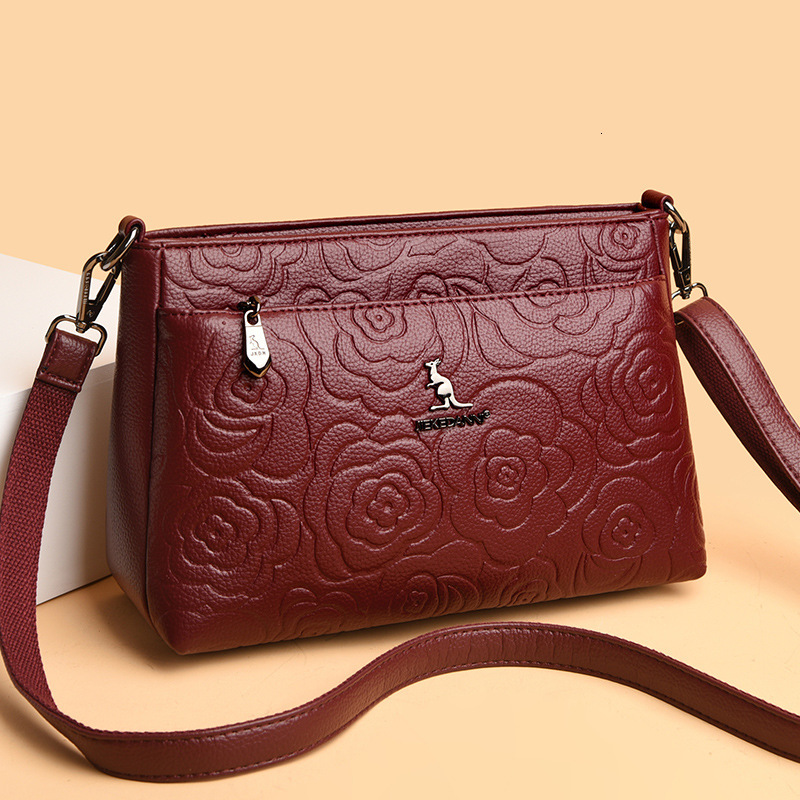Free Shipping 2025 Designer's New Women's Kangaroo Shoulder Crossbody Bag, Simple And Multifunctional Embossed Middle-aged Women's Moth