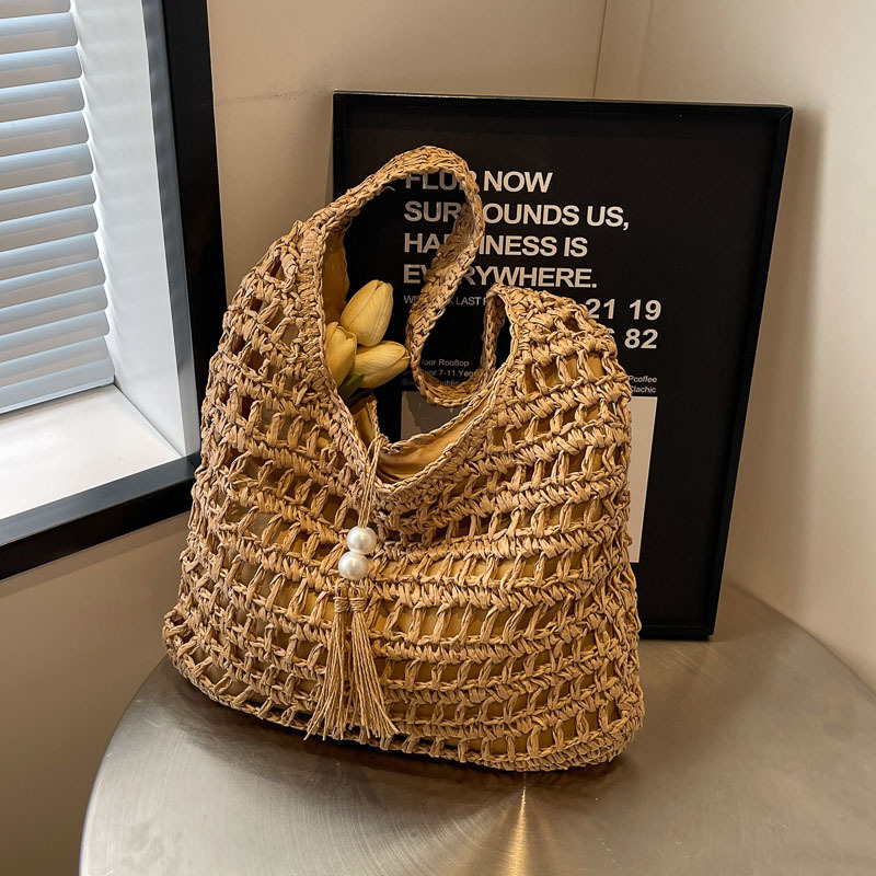 Free shipping designer Trendy Woven Large Bag for Women 2025 New Summer Fashion Beach Hollow Out Beach Bag Versatile Straw Bag