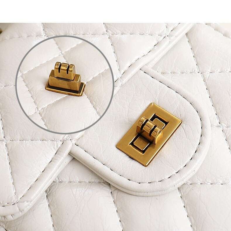 Single shoulder crossbody mini bag 2025 new leather tassel hardware ball diamond grid chain mobile phone bag