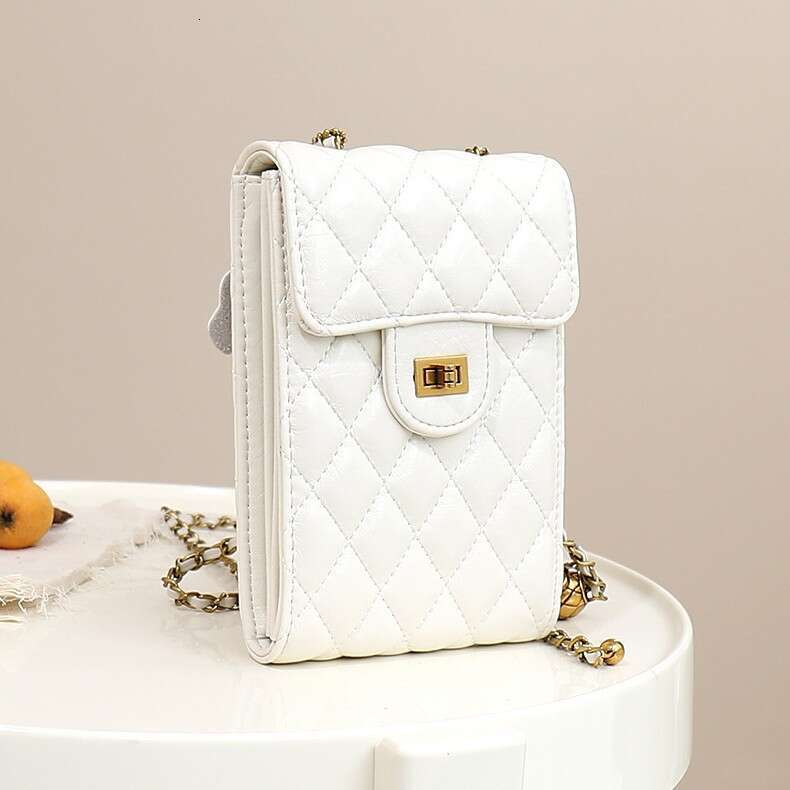 Single shoulder crossbody mini bag 2025 new leather tassel hardware ball diamond grid chain mobile phone bag