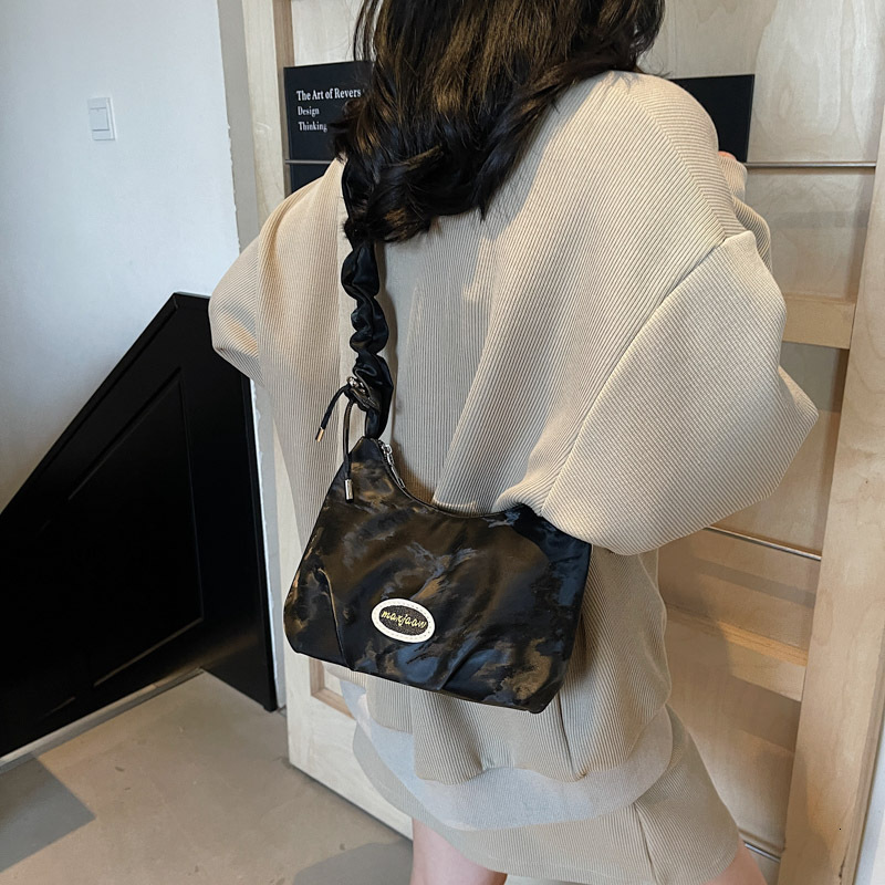 Free shipping designer Summer Hot Niche Bag for Women 2025 New Commuter Crossbody Bag High-end Fashion Pleated Shoulder Bag Underarm Bag