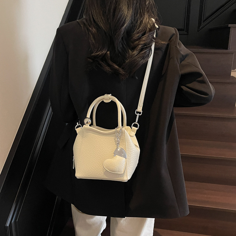 Free shipping designer Pink Handbag Small Tote Bag for Women 2025 New Spring Light Luxury Niche High-End Crossbody Bag Basket Bag Bucket Bag