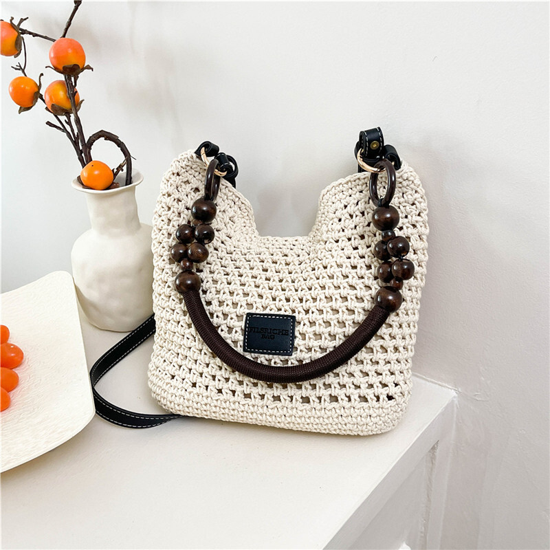 Free shipping designer Beach Vacation Beach Woven Bag for Women 2025 New Summer Hollow Knitted Handbag Large Capacity Shoulder Bag Straw Bag