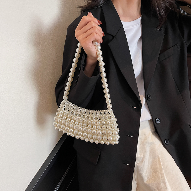 Free shipping designer Fashion High-End Underarm Bag for Women Korean Version Ins Trend Woven Pearl Bag 2025 New Niche Single Shoulder Bag for Women