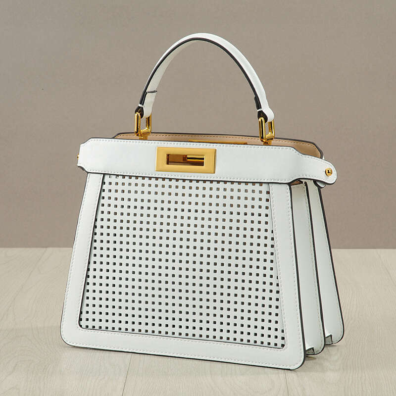 Leather Bag Bucket Bag New Style Wind Organ Cowhide Women S Hollow Cat Handbag Twist Lock Tote Handheld Shoulder Bag Trendy Tote Bag