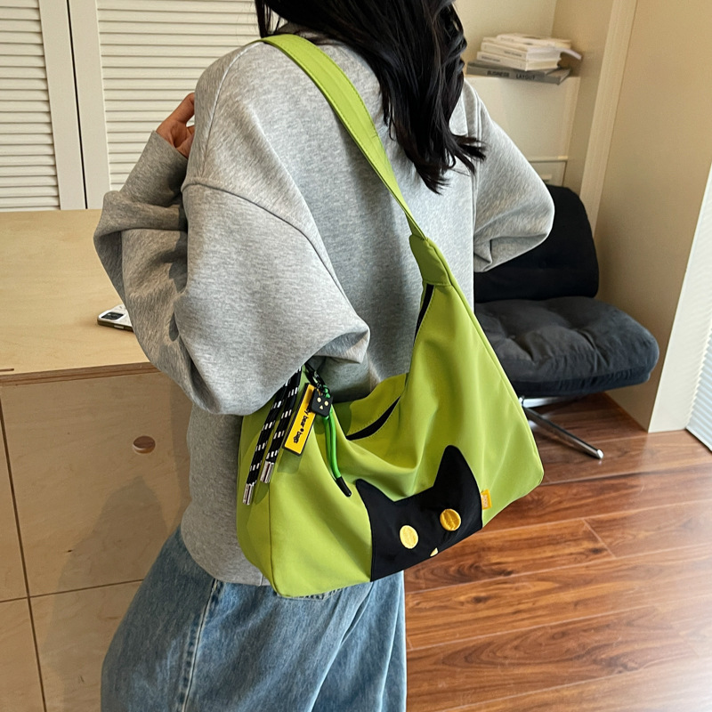 Free shipping designer Casual Cute Lightweight Cat Canvas Bag for Women 2025 New Large Capacity Commuter Tote Bag High-end Feel Shoulder Bag