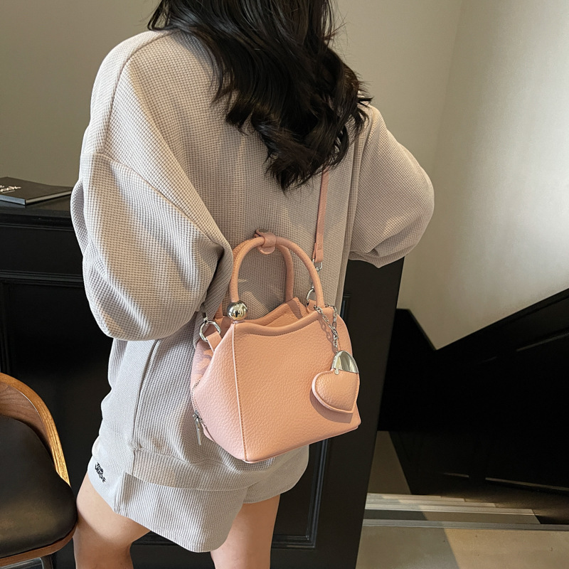 Free shipping designer Pink Handbag Small Tote Bag for Women 2025 New Spring Light Luxury Niche High-End Crossbody Bag Basket Bag Bucket Bag