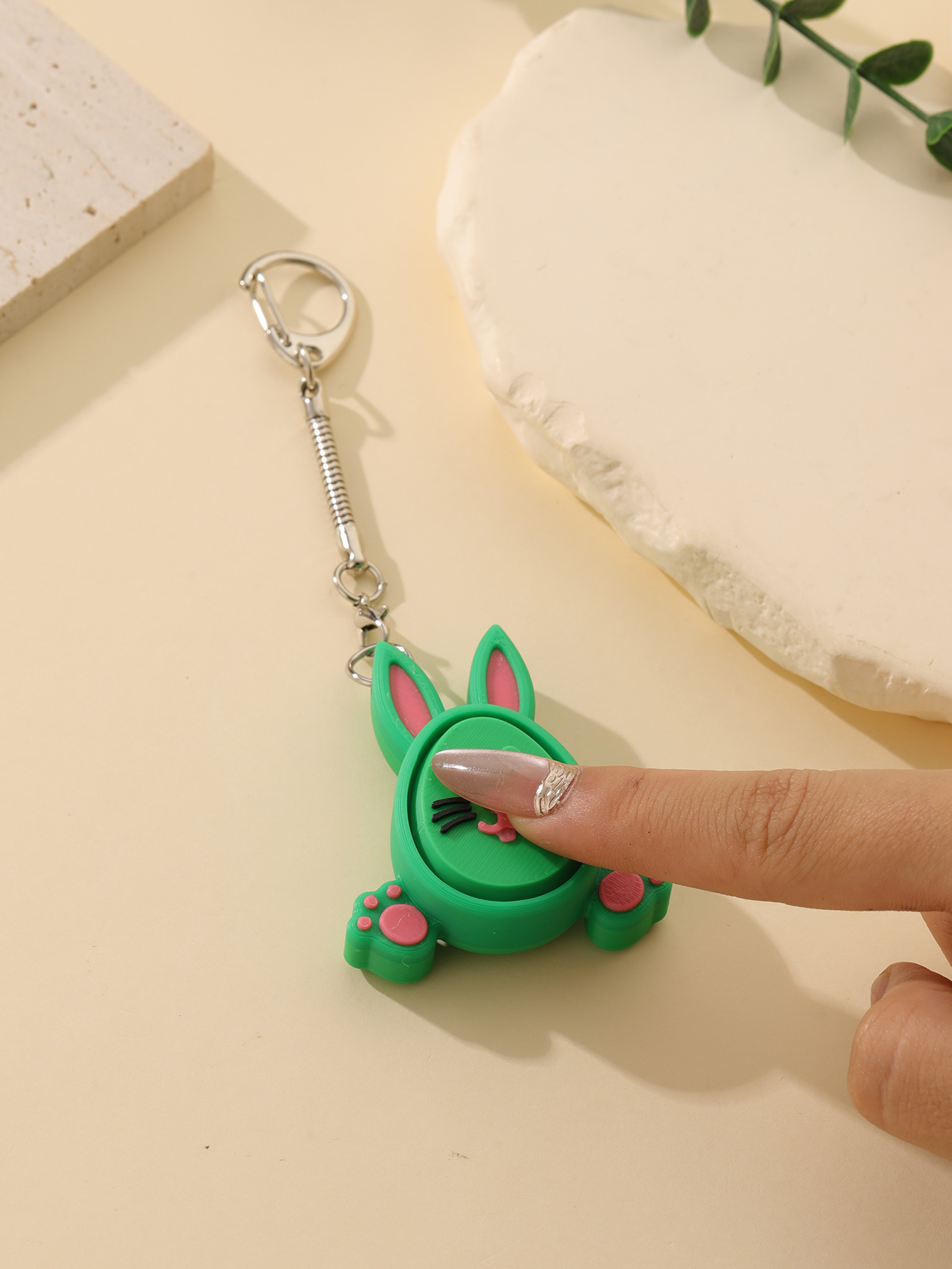 3D printed little rabbit keychain - an adult stress relief toy with a portable anxiety-reducing gadget featuring a clickable keyboard design