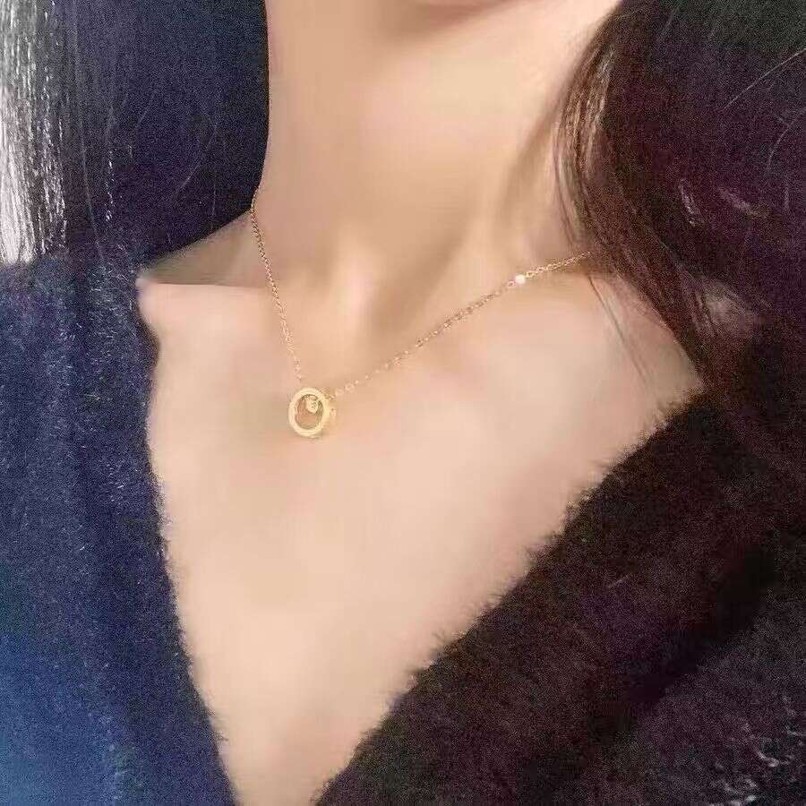 DHcollections Women New Model Roman Turntable Light Niche Clavicle High-end Sense Neck Chain Titanium Steel Necklace
