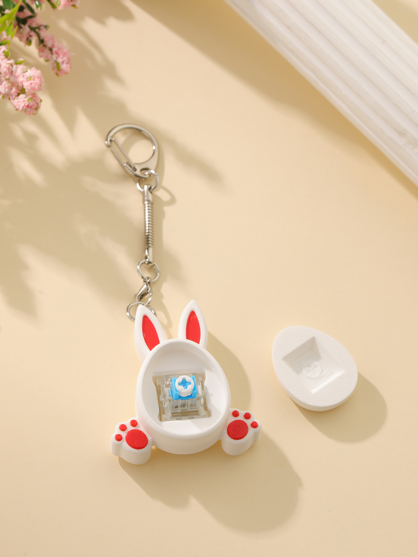 3D printed little rabbit keychain - an adult stress relief toy with a portable anxiety-reducing gadget featuring a clickable keyboard design