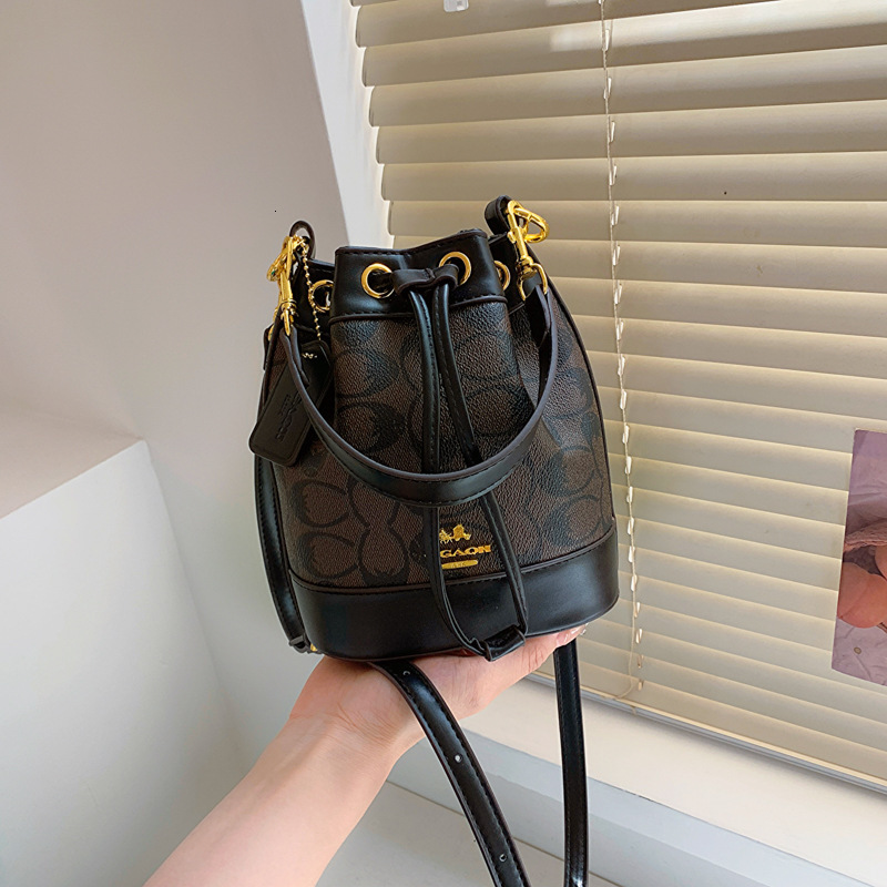 Designer Presbyopic Bucket for Women 2025 New Printed Crossbody Fashionable Versatile Drawstring Handheld Shoulder Light Luxury Women's Bag