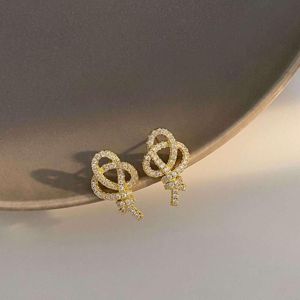 DHcollections New Fashion High-End Design Knot Exquisite Zircon Earrings Elegant Beautiful Compact Simple Commuting Women