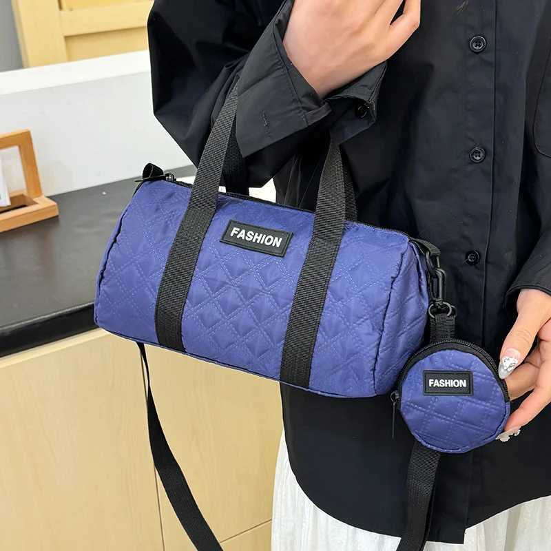 Neutral male and female style nylon fabric handbags single shoulder light and compact cylindrical bags