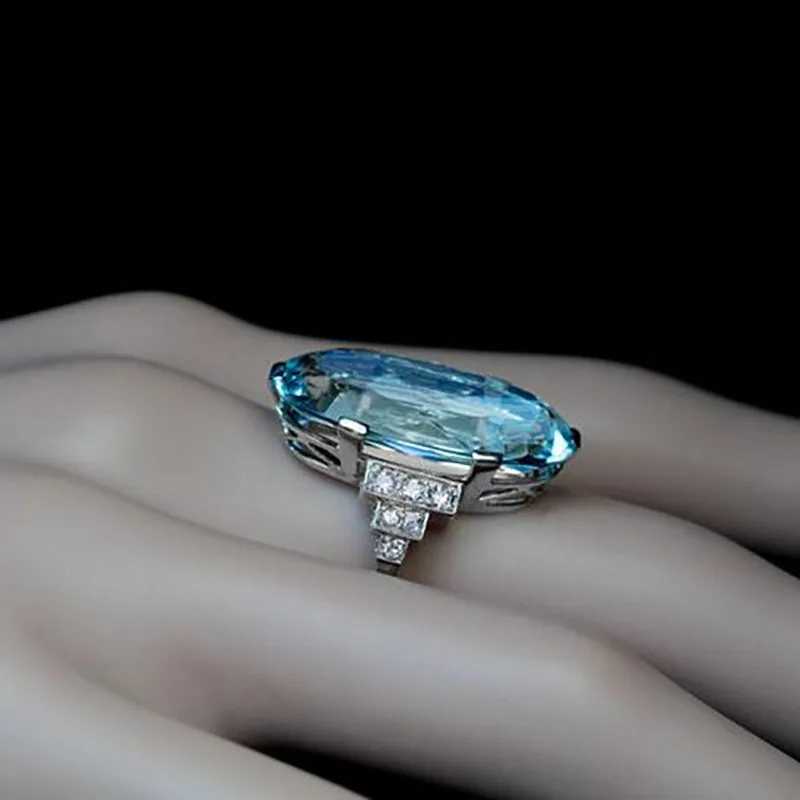 925 Sterling Silver Female Blue Wedding Ring Band Oval Stone Engagement Party Women Luxury Jewelry Shine CZ Stone Jewelry Gift XJ250707